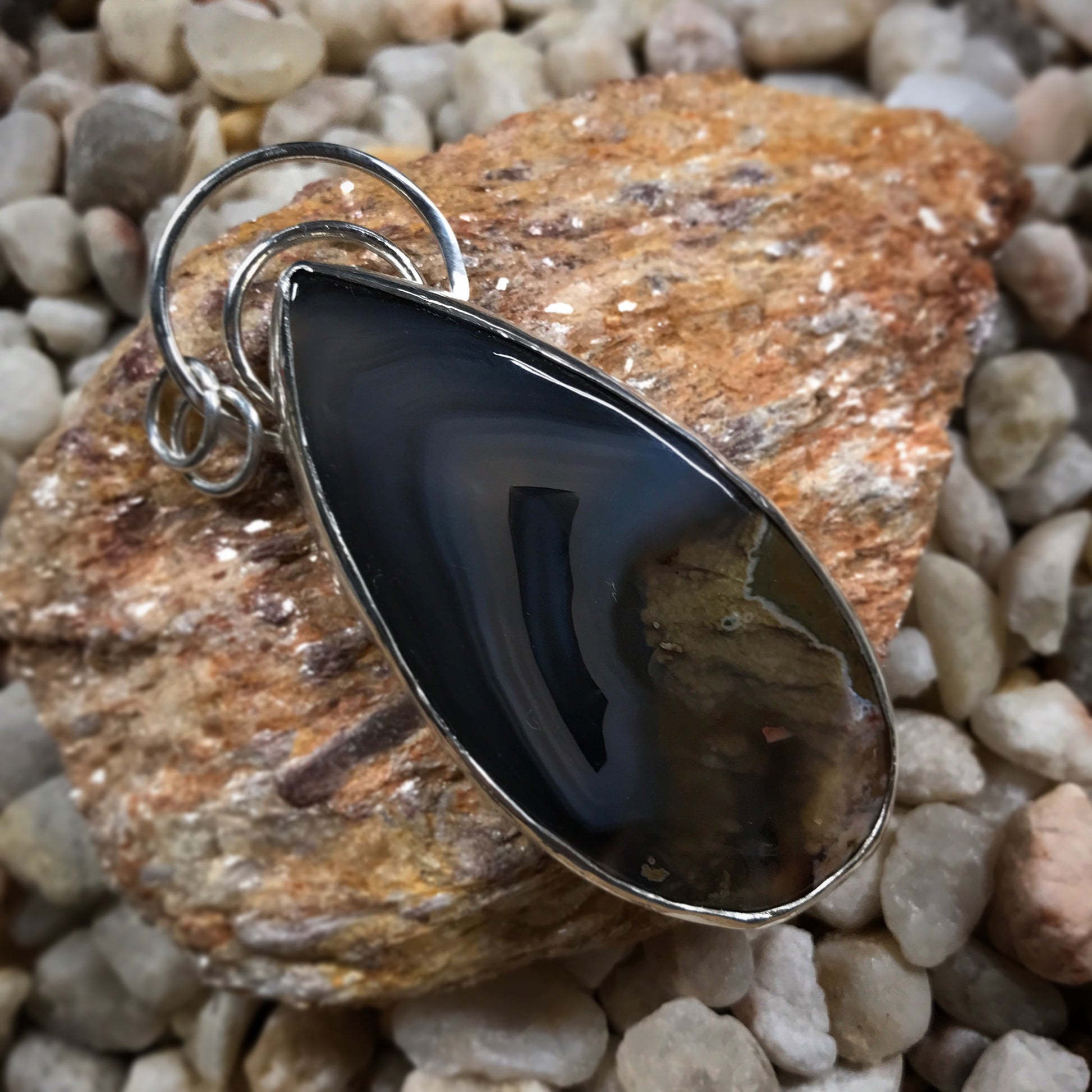 EMBER PENDANT   This handmade pendant is made of a Thunder Egg Cabochon set in Argentium sterling silver.